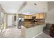 Updated kitchen featuring stainless steel appliances, granite countertops, and ample storage space at 6262 142Nd N Ave # 1304, Clearwater, FL 33760