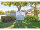 Entrance sign for Via Verde, a deed-restricted community, surrounded by lush landscaping and greenery at 6262 142Nd N Ave # 1304, Clearwater, FL 33760