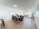 Open-plan living space with a dining area with views of the waterfront at 7862 Sailboat Key S Blvd # 103, South Pasadena, FL 33707