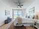 Bright main bedroom with access to a private balcony and views of the waterfront at 7862 Sailboat Key S Blvd # 103, South Pasadena, FL 33707