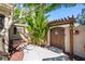 Charming backyard with a wooden gate, lush greenery, and a tranquil atmosphere at 8205 Overlook Ne Pl, St Petersburg, FL 33702