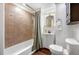 The remodeled bathroom features a shower-tub combo, a vanity, and a toilet at 8205 Overlook Ne Pl, St Petersburg, FL 33702