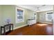 Bedroom with wood floors and a vintage dresser at 8205 Overlook Ne Pl, St Petersburg, FL 33702