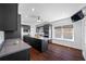 This kitchen is equipped with stainless appliances, granite countertops and dark cabinets at 8205 Overlook Ne Pl, St Petersburg, FL 33702