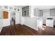 Convenient laundry area with modern appliances, storage, and easy access to the rest of the home at 8205 Overlook Ne Pl, St Petersburg, FL 33702