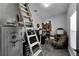 An attic access area with a ladder and various items at 9017 S County Line Rd, Lithia, FL 33547