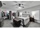 Spacious primary bedroom with a large closet and plenty of natural light from the window at 9017 S County Line Rd, Lithia, FL 33547