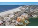 Stunning aerial view of the condo building near the beach and coastline, offering a desirable location at 10301 Gulf Blvd # 302, Treasure Island, FL 33706