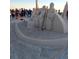 Elaborate sand sculpture of religious figures on a Florida beach, created for public viewing at 10301 Gulf Blvd # 302, Treasure Island, FL 33706