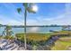 Backyard featuring a fence and water view at 10301 Gulf Blvd # 302, Treasure Island, FL 33706