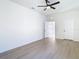 This bedroom has neutral walls, modern floors, and ensuite bathroom access at 10818 Breaking Rocks Dr, Tampa, FL 33647