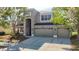 Charming two story home with a three car garage, fresh paint, and a covered porch at 10818 Breaking Rocks Dr, Tampa, FL 33647