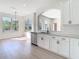 Bright kitchen with granite countertops, stainless steel appliances, and large windows at 10818 Breaking Rocks Dr, Tampa, FL 33647
