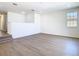 Bright loft area showcasing stairs and a window at 10818 Breaking Rocks Dr, Tampa, FL 33647
