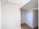 A bright walk-in closet offers ample shelving and lots of space at 10818 Breaking Rocks Dr, Tampa, FL 33647