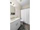 Well-maintained bathroom featuring a vanity, mirror, and shower-tub combination at 1120 Radison Ave # 6, Sun City Center, FL 33573
