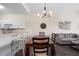 Dining area featuring modern lighting, table, and seating at 1120 Radison Ave # 6, Sun City Center, FL 33573