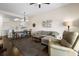 Bright living space with open layout to dining area and comfortable seating at 1120 Radison Ave # 6, Sun City Center, FL 33573