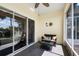 Relaxing screened patio with comfortable seating, offering a peaceful outdoor living space at 1120 Radison Ave # 6, Sun City Center, FL 33573