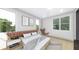 Bright bedroom featuring a large window and neutral decor at 1215 E Broad St, Tampa, FL 33604