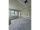 Upstairs bonus room featuring new windows and installed drywall, ideal for entertaining at 1215 E Broad St, Tampa, FL 33604