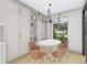 Dining room featuring a chandelier and hardwood floors at 1215 E Broad St, Tampa, FL 33604