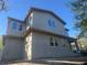 Contemporary two-story home featuring an unfinished landscape and modern lines at 1215 E Broad St, Tampa, FL 33604
