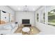 Bright living room with hardwood floors and natural light at 1215 E Broad St, Tampa, FL 33604