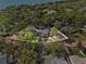Breathtaking aerial view of an expansive property surrounded by lush greenery near the ocean, offering privacy at 1320 Coral S Way, St Petersburg, FL 33705