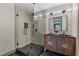Modern bathroom featuring a glass-enclosed shower and a stylish double vanity at 1320 Coral S Way, St Petersburg, FL 33705
