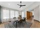 Sun-filled dining room features modern decor, sleek lighting and an accent rug at 1320 Coral S Way, St Petersburg, FL 33705