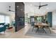Open-concept floorplan seamlessly connects living and dining areas, creating a modern gathering space at 1320 Coral S Way, St Petersburg, FL 33705