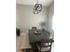 Open dining room area featuring modern chandelier and neutral wall color at 14305 Tennyson Dr, Hudson, FL 34667