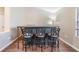 Bar area with seating and hardwood floors at 16808 Woburn Ln, Lutz, FL 33549