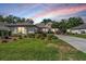 Beautiful home with lush landscaping, well-manicured lawn and inviting curb appeal at 16808 Woburn Ln, Lutz, FL 33549