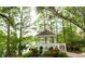 Scenic gazebo overlooking a pond, surrounded by lush landscaping at 16808 Woburn Ln, Lutz, FL 33549