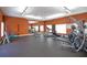 Well-equipped fitness center with treadmills, weight machines, mirror, and rubber flooring at 17035 Gulf Blvd # 205, North Redington Beach, FL 33708