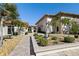 Exterior view of the community center, showcasing inviting landscaping and a welcoming entrance at 19029 Us Highway 19 N # 27E, Clearwater, FL 33764