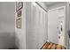 Hallway features closet with paneled doors and access to other rooms at 19029 Us Highway 19 N # 27E, Clearwater, FL 33764