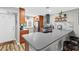 Spacious kitchen featuring an island, stainless steel appliances, and modern finishes at 19029 Us Highway 19 N # 27E, Clearwater, FL 33764