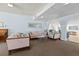 Inviting living area with comfortable seating, soft lighting, and tranquil decor, providing a cozy space for relaxation and socializing at 19029 Us Highway 19 N # 27E, Clearwater, FL 33764