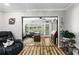 Bright sun room featuring a piano and desk with views of the backyard at 19029 Us Highway 19 N # 27E, Clearwater, FL 33764