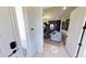 Inviting living room featuring a cozy seating area, custom built-ins, and natural light creating a warm atmosphere at 1904 146Th E Ter, Parrish, FL 34219