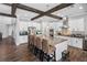 Stunning kitchen features an oversized granite island, modern stainless steel appliances, and elegant lighting fixtures at 19412 Lonesome Pine Dr, Land O Lakes, FL 34638
