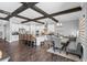 Large kitchen with an island, white cabinetry, pendant lighting, and seating for a casual dining area at 19412 Lonesome Pine Dr, Land O Lakes, FL 34638