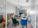 Well-lit home office with a large desk, comfortable seating, and ample storage space at 19412 Lonesome Pine Dr, Land O Lakes, FL 34638