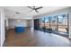 Open floor plan with eat-in kitchen, hardwood floors, and sliding door to balcony at 199 Dali Blvd # 804, St Petersburg, FL 33701