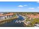 Aerial view of condo community features a boat dock and waterfront access at 234 Mariner Dr # 234, Tarpon Springs, FL 34689