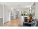 Condo lobby features tiled floors, seating, access to elevator, and views of outdoor area at 234 Mariner Dr # 234, Tarpon Springs, FL 34689