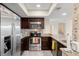 Well-equipped kitchen featuring stainless steel appliances, granite countertops, and ample cabinet space at 234 Mariner Dr # 234, Tarpon Springs, FL 34689